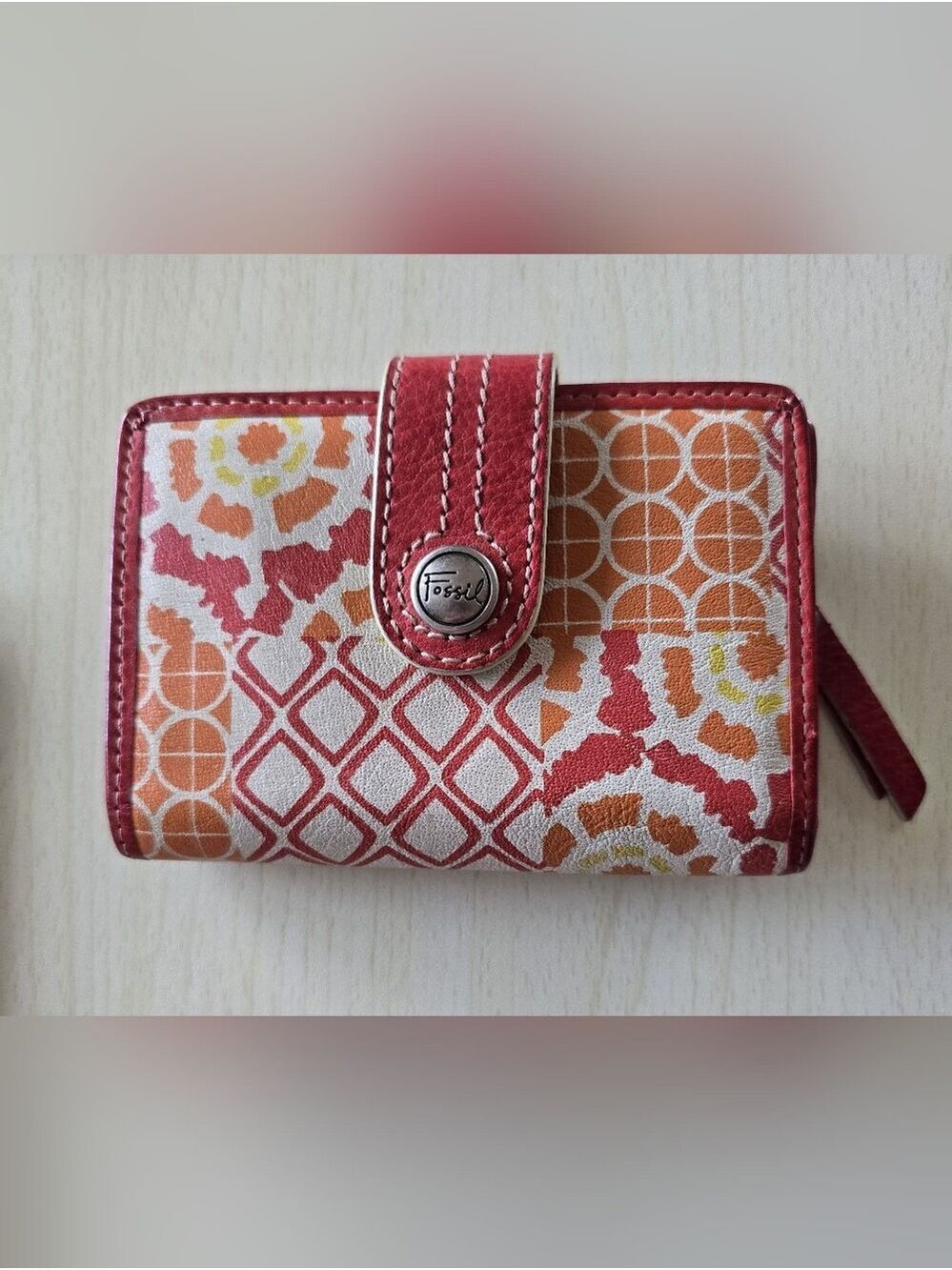 Colorful patterned Fossil clutch bifold wallet.  